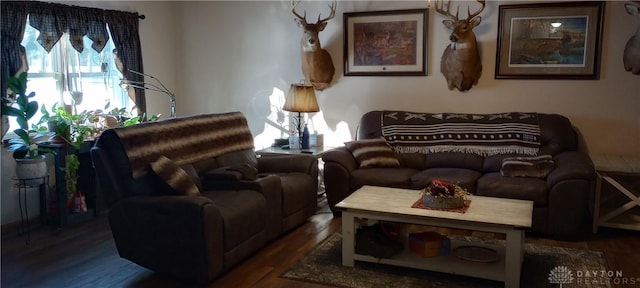 living room with wood finished floors