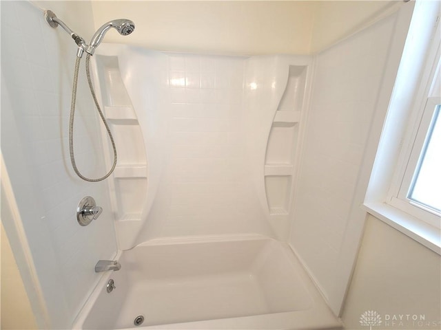 bathroom featuring shower / bath combination