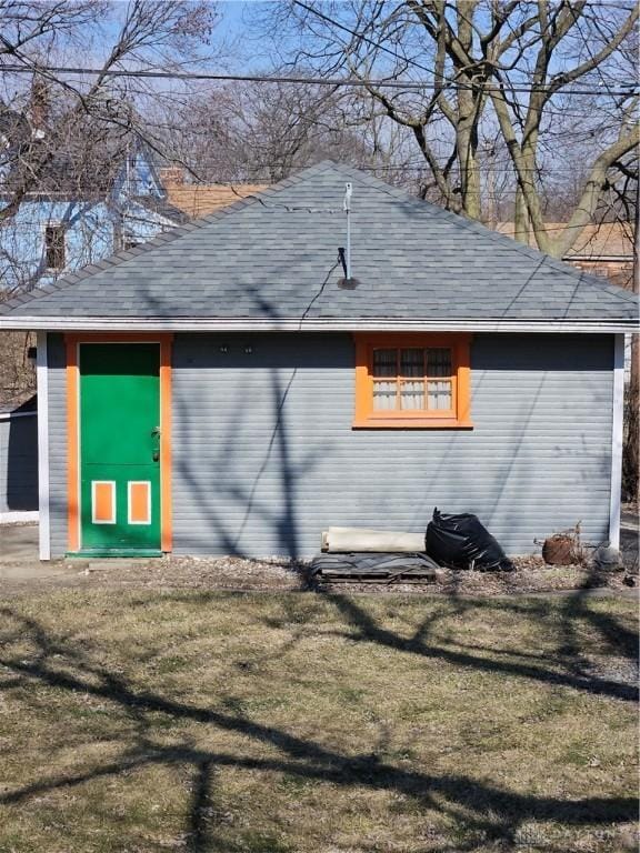 garage featuring a yard