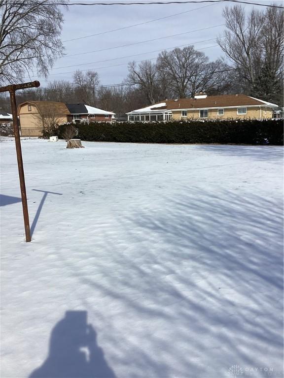 view of snowy yard