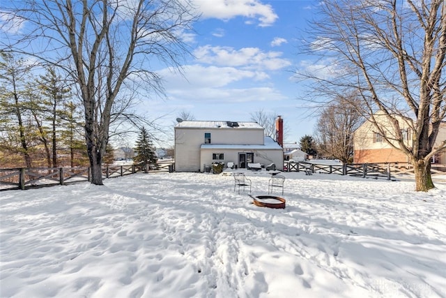 view of snow covered property