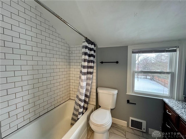 full bathroom with vanity, vaulted ceiling, toilet, and shower / bath combo with shower curtain