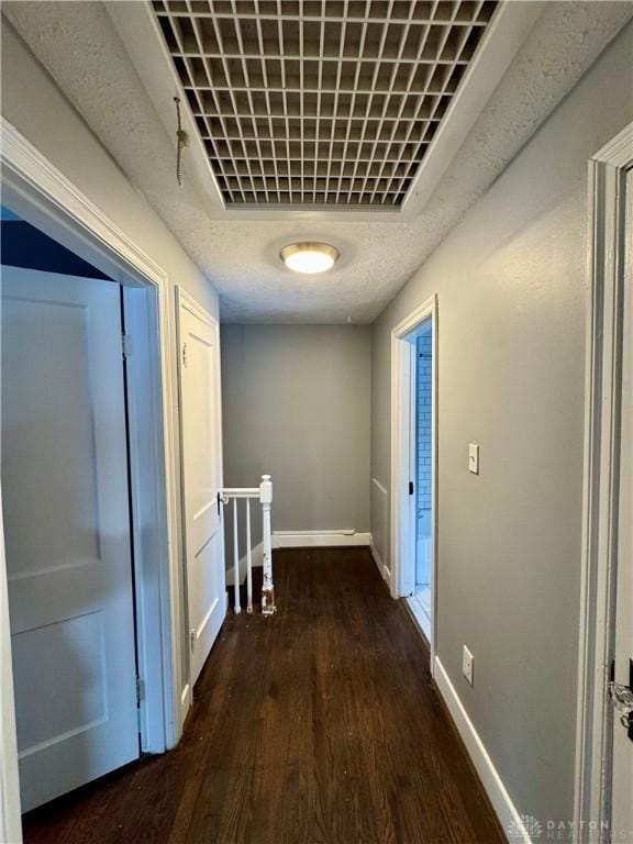 hall with dark hardwood / wood-style floors