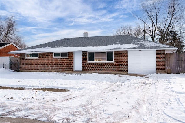 view of front of property featuring a garage