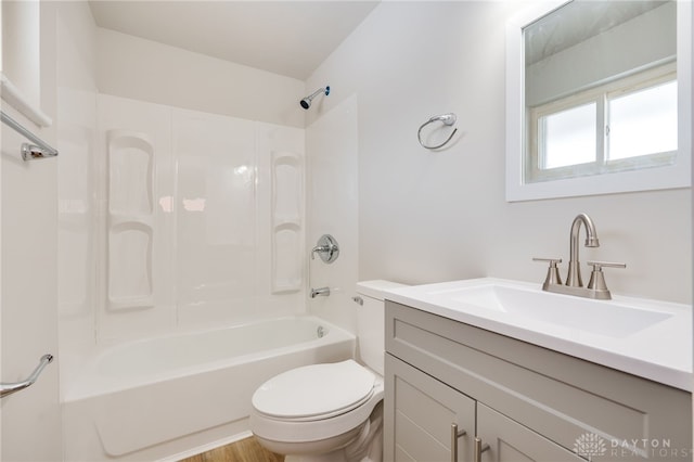 full bathroom featuring vanity, shower / bathing tub combination, and toilet