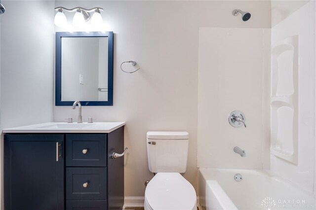 full bathroom featuring shower / bathtub combination, vanity, and toilet