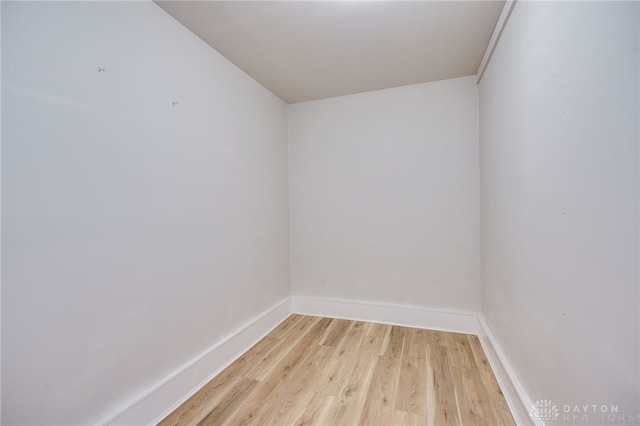 spare room featuring light hardwood / wood-style floors