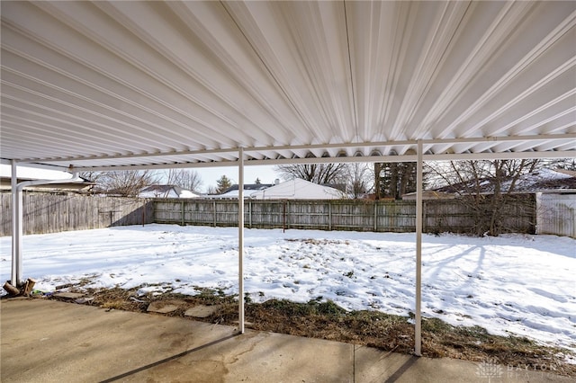 view of snow covered patio