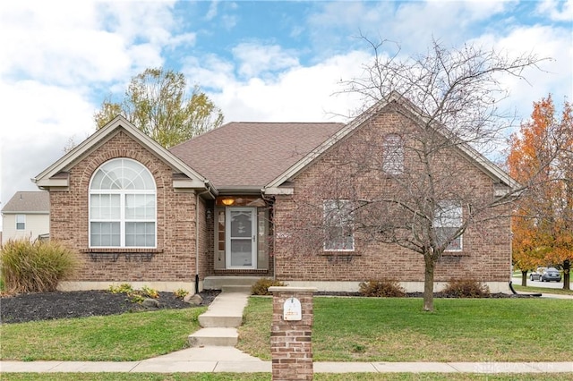 view of front of property with a front yard