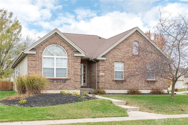 front of property featuring a front lawn