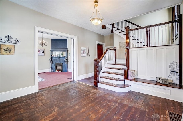 foyer entrance with hardwood / wood-style floors