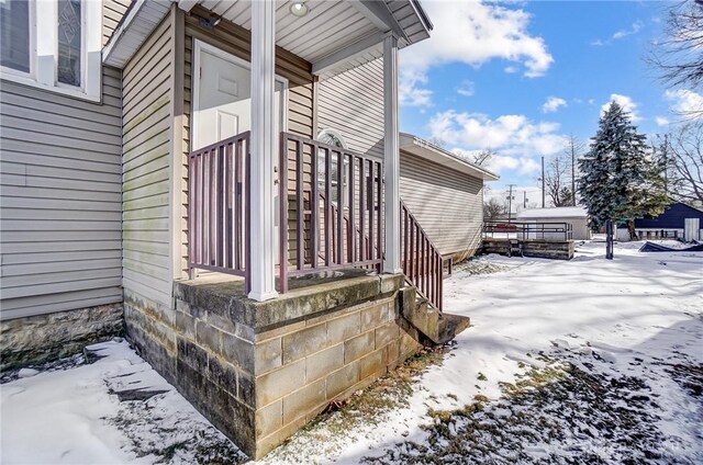 view of snow covered property