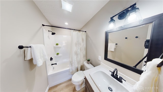 full bathroom with toilet, vanity, and shower / bath combination with curtain