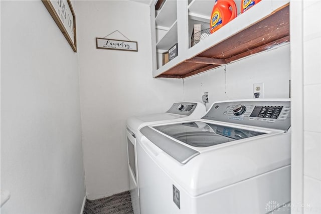 laundry area with separate washer and dryer