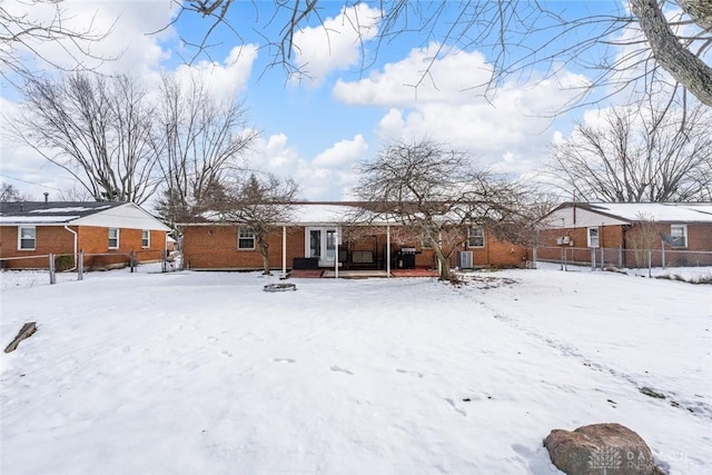 view of snow covered property