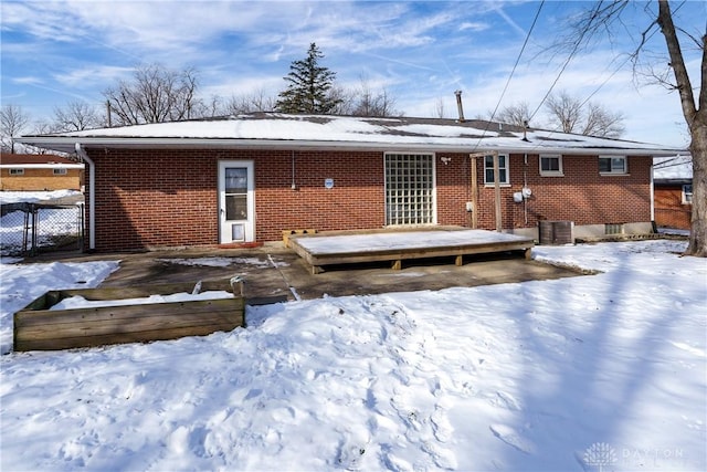 view of snow covered property