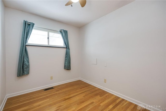 unfurnished room featuring ceiling fan and wood-type flooring