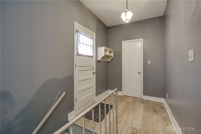 entryway with light hardwood / wood-style flooring