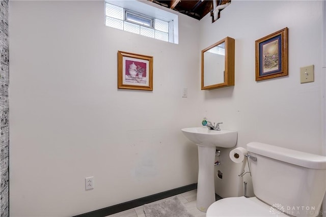 bathroom featuring toilet