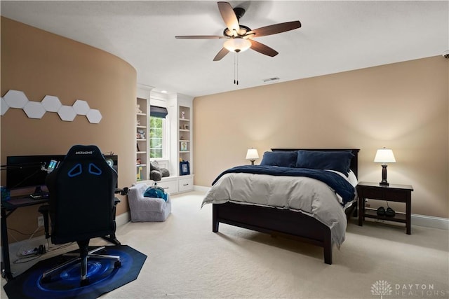 bedroom featuring ceiling fan and light colored carpet