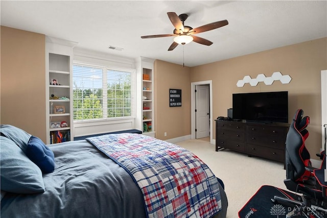 carpeted bedroom featuring ceiling fan