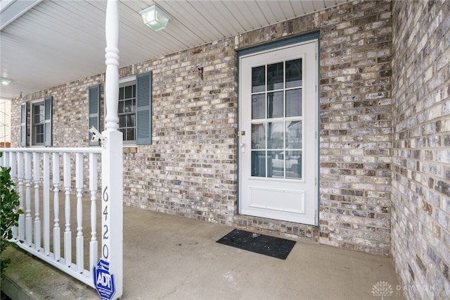 property entrance with a porch