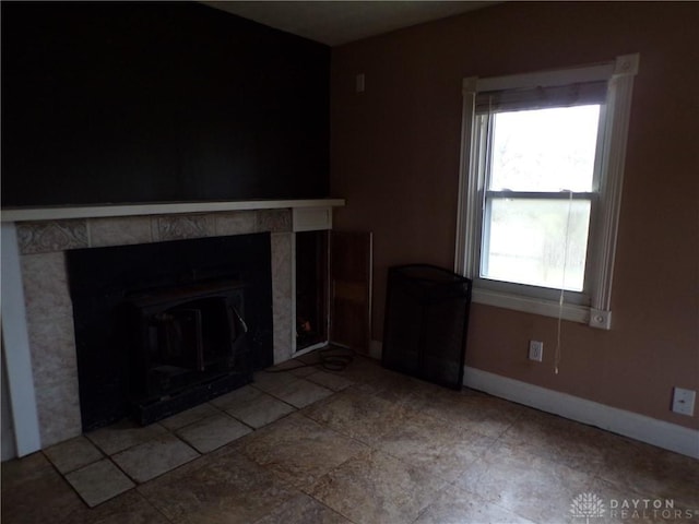 unfurnished living room with a fireplace