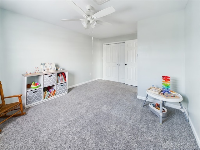 recreation room featuring carpet floors and ceiling fan