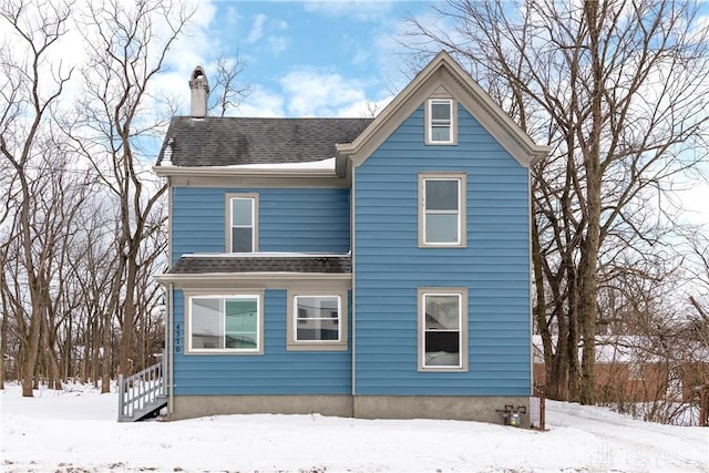 view of snow covered property