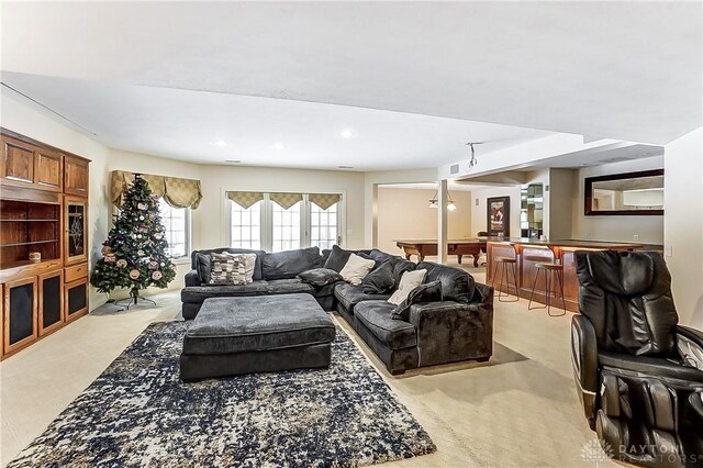 living room featuring light colored carpet