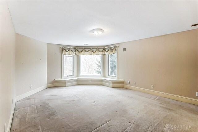 view of carpeted spare room