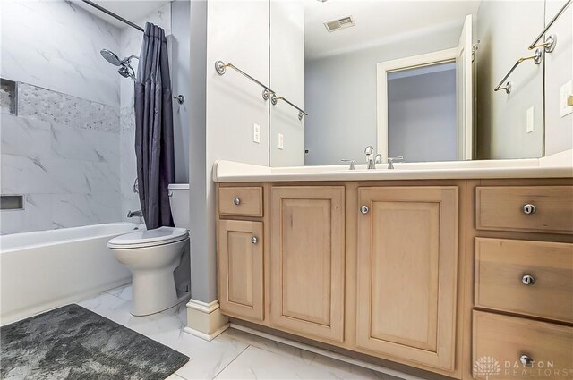 full bathroom with shower / bath combo, vanity, and toilet