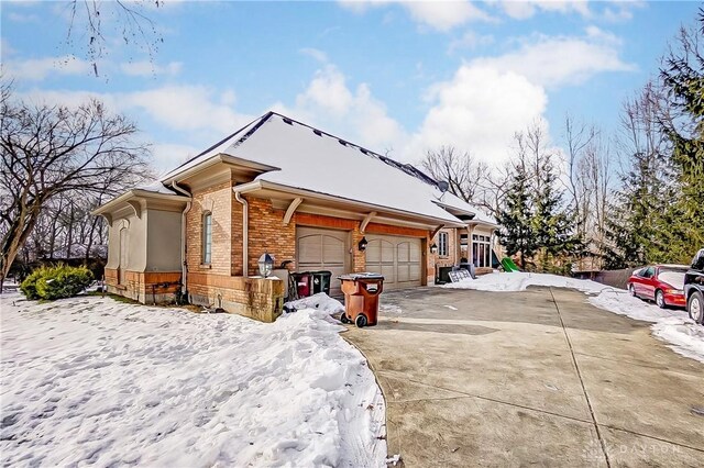 view of front of home with a garage