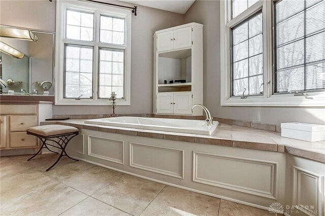 bathroom with sink and tile patterned floors