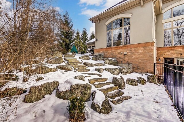 view of yard covered in snow