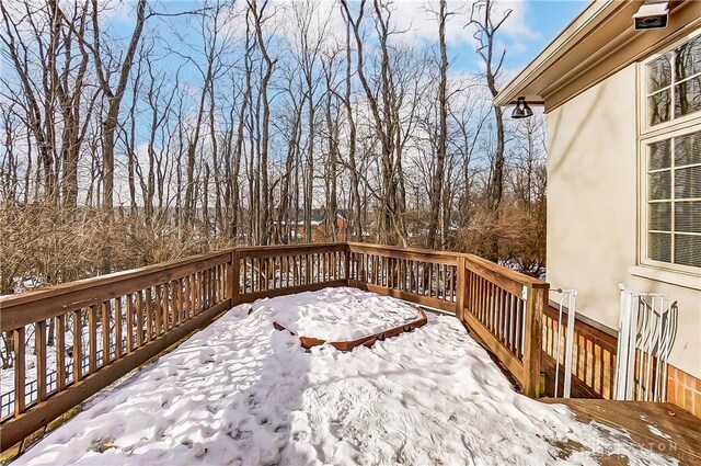 view of snow covered deck