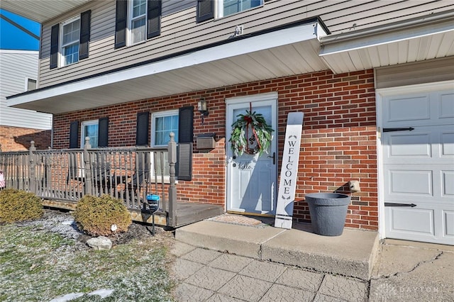 entrance to property featuring a garage