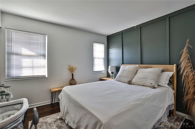 bedroom featuring dark wood-type flooring