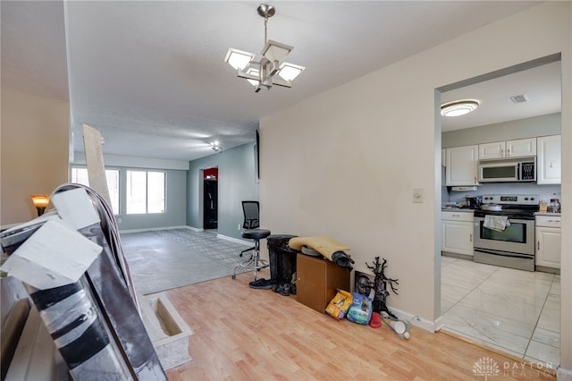 interior space with light hardwood / wood-style floors