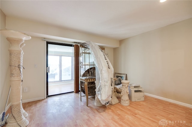 misc room with wood-type flooring