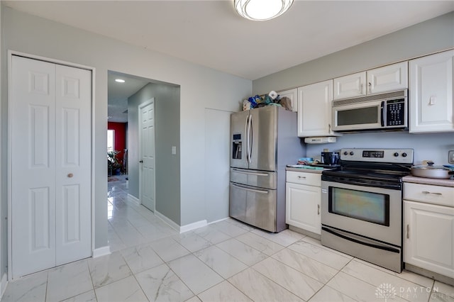 kitchen featuring white cabinets and stainless steel appliances