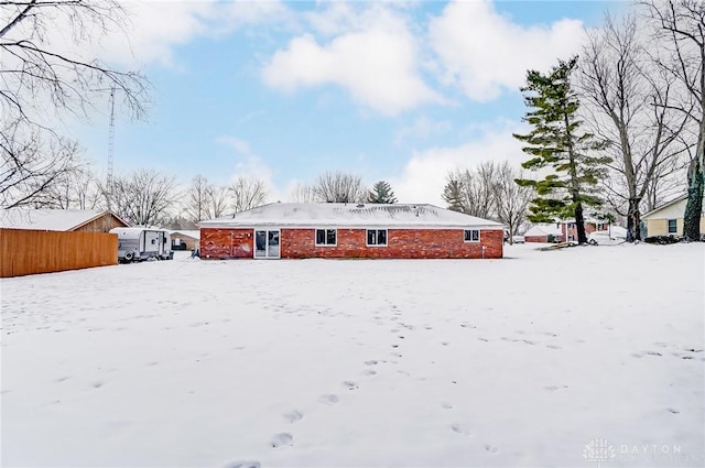 view of snow covered property