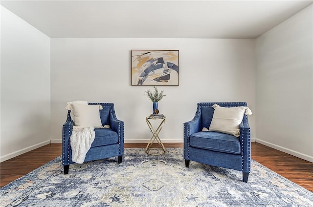 sitting room featuring hardwood / wood-style flooring