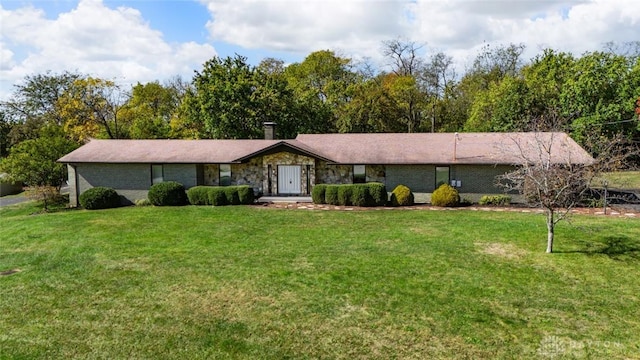 ranch-style house with a front lawn