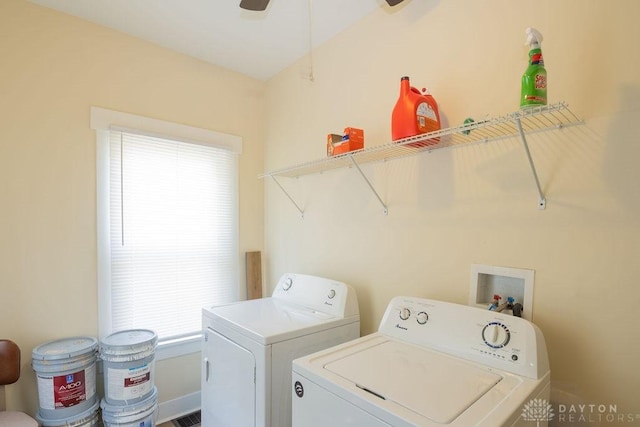 clothes washing area with ceiling fan and washer and clothes dryer