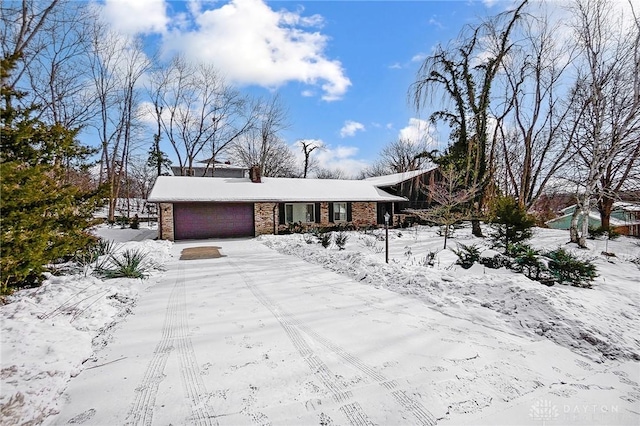 single story home with a garage