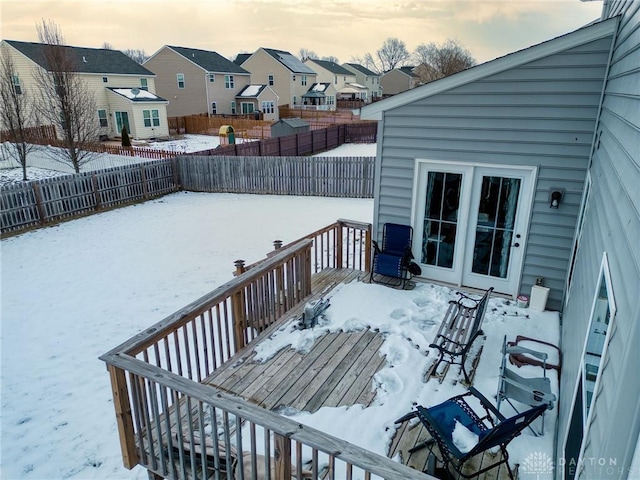 view of snow covered deck