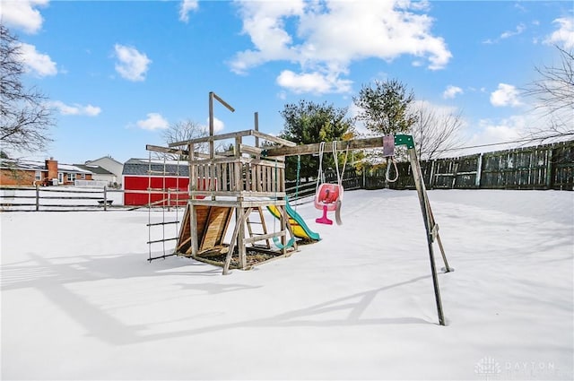 view of snow covered playground