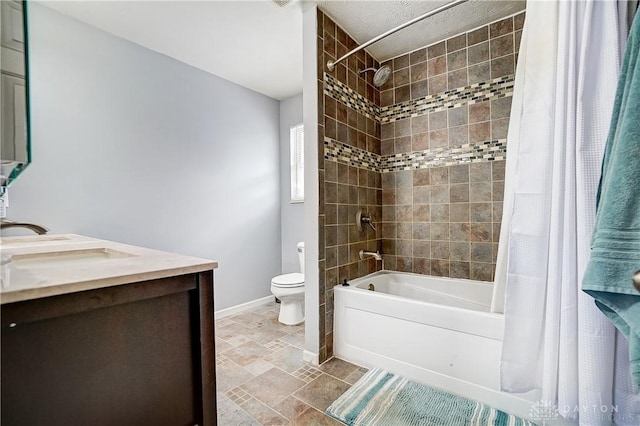 full bathroom with vanity, toilet, and shower / tub combo