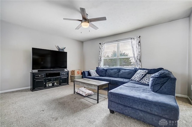 living room with ceiling fan and carpet flooring